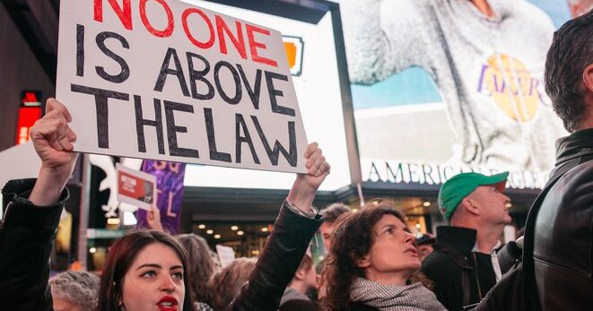 Democrats hand out fake Social Security cards to illegal immigrants during a ‘No One Is Above the Law’ rally